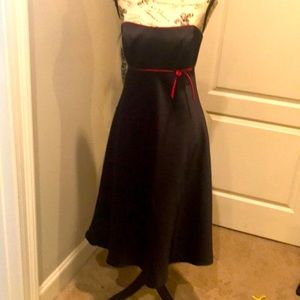 Strapless black satin with magenta piping and bow Size XS